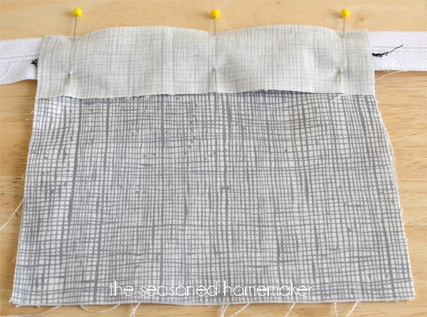 fabric pinned to zipper
