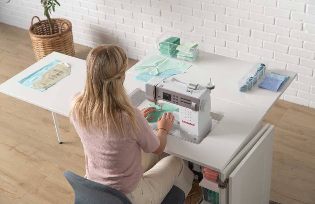 Sew Station with woman sewing