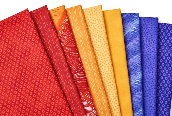 Learn how to choose fabrics for a quilt.