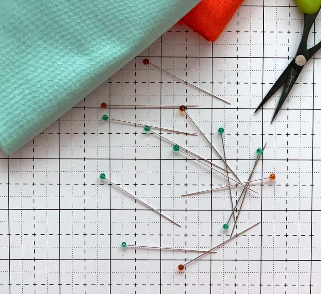 Clover Glass Head Pins on cutting mat