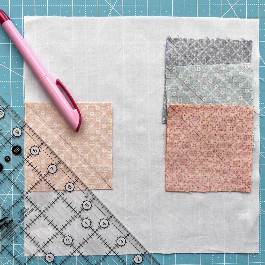 draw diagonal lines on back of snowball quilt block squares. This will be the sewing line.