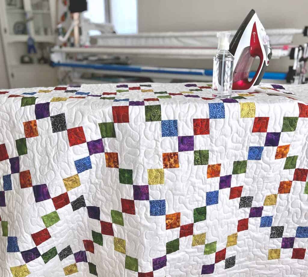 quilt on ironing board